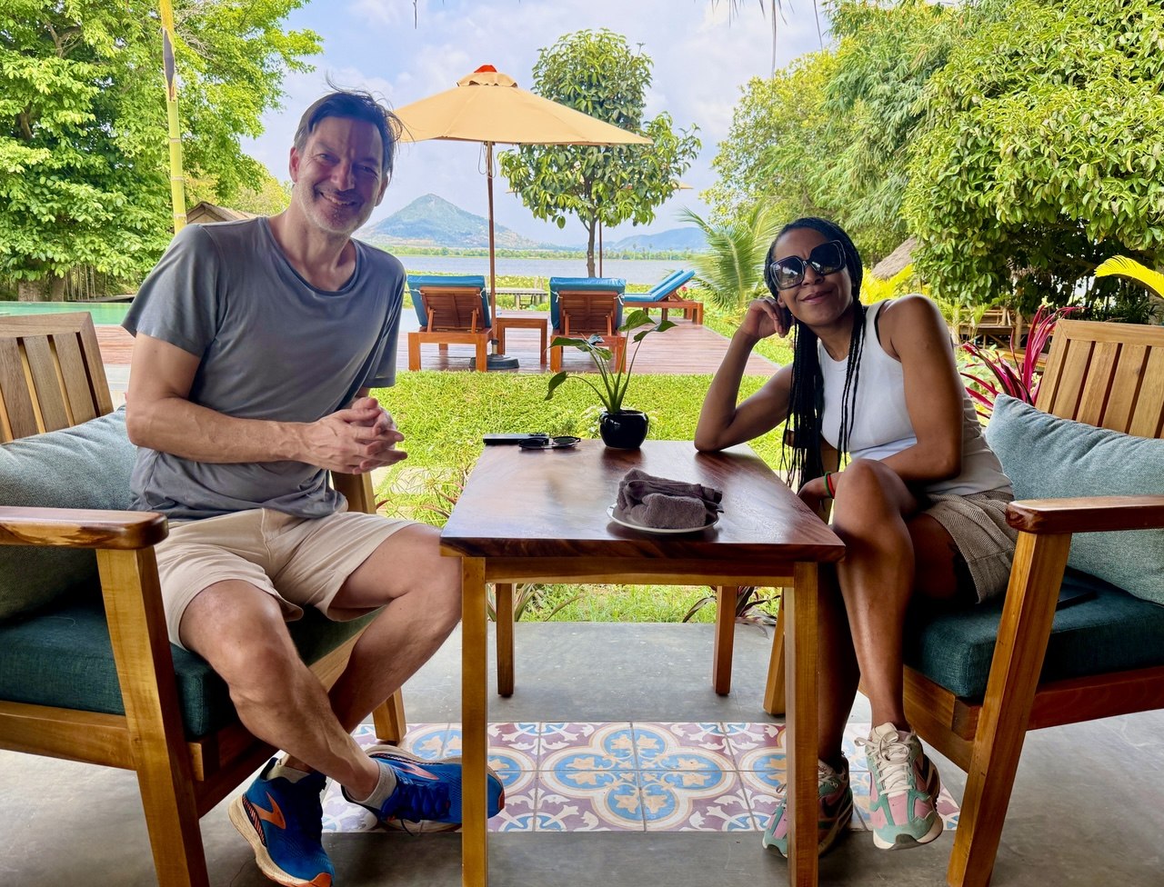 Guests relaxing by the lake